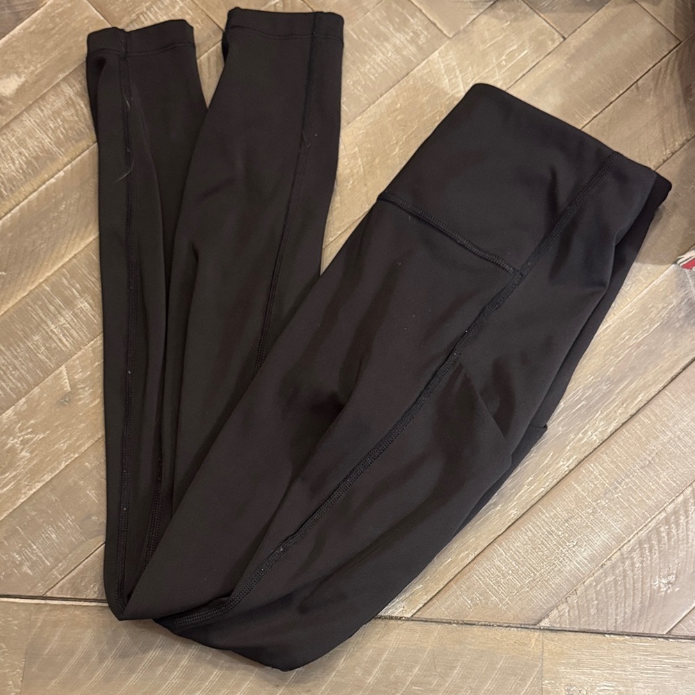 Athleta Ultimate Stash Pocket 7/8 Tight in Black